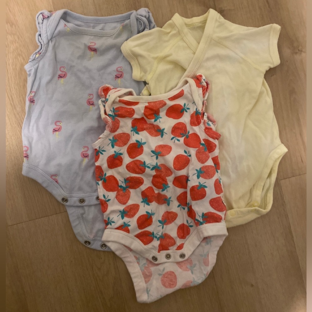 Bundle of baby onesies